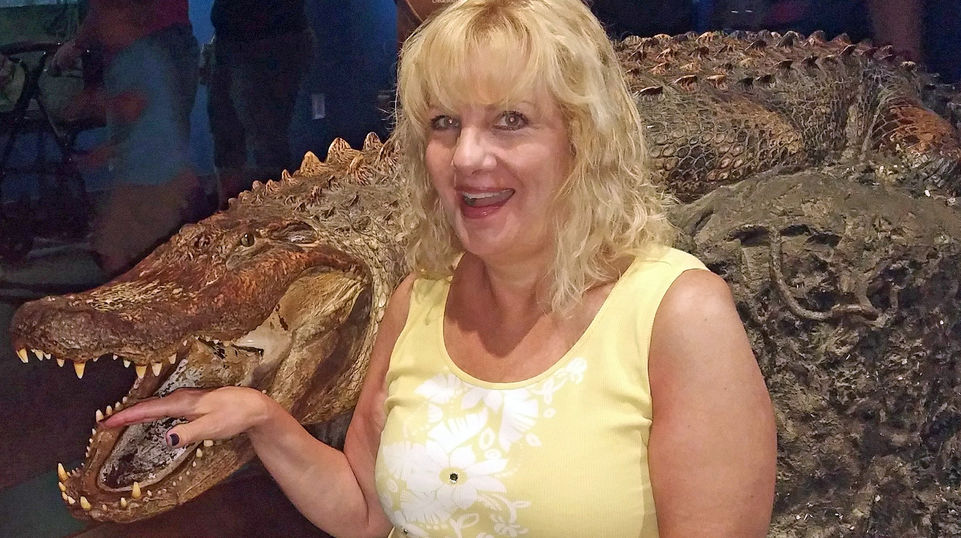 Debbie O'Leary visiting an aquarium at the Outer Banks of North Carolina